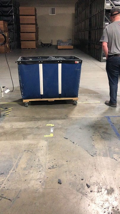 Guy Gets Dirty in Laundry Cart