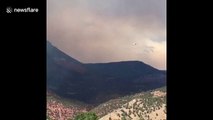 Dramatic footage captures plane dropping retardant to control Colorado fire