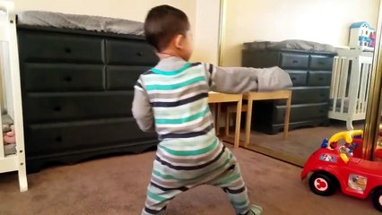 Watch when this toddler gets his toy phone to play his jam