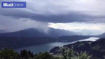 Spectacular timelapse footage captures storm dumping tonnes of water in an Alpine lake