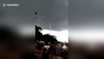 Funnel cloud scares islanders as it heads towards land