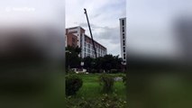 University rents crane to help students move into new dorms