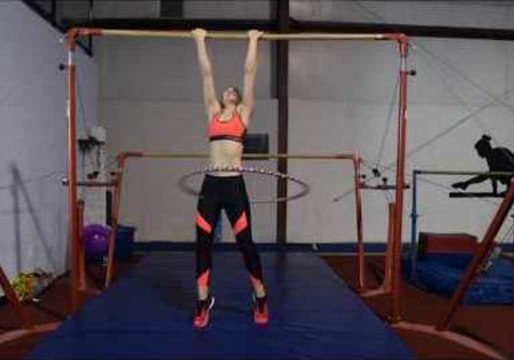 Woman Attempts World Record For Most Chin-ups While Hula Hooping