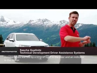 Audi Q7 - Driver assistance systems - Exit warning | AutoMotoTV