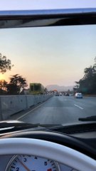 Driving with the Golden Gate Bridge in the background