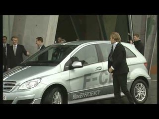 Michael Schumacher and Nico Rosberg driving  Mercedes Benz B-Class F-Cell