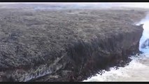 Firehose' of lava pours out of Hawaiian cliff in a single spout