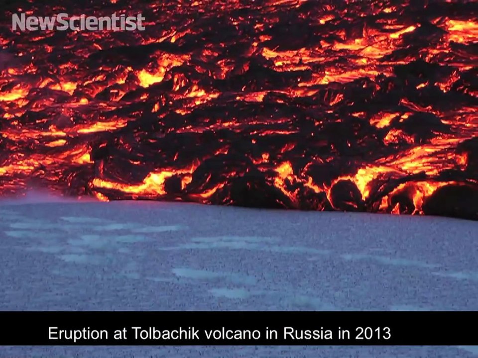 Red hot lava battles snow as volcano erupts