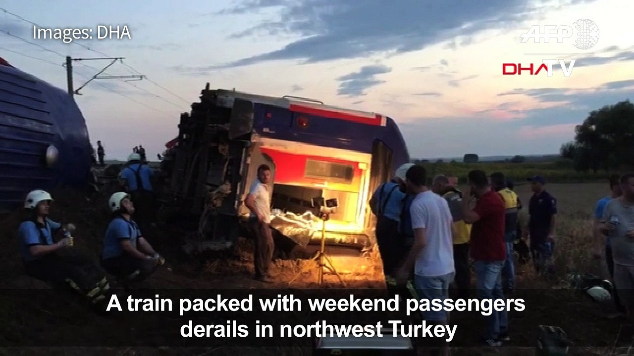 Turkish rescuers attend to passengers after train accident