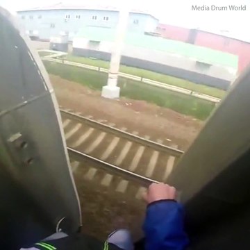 This ‘train surfing’ thrill-seeker is in so much danger!