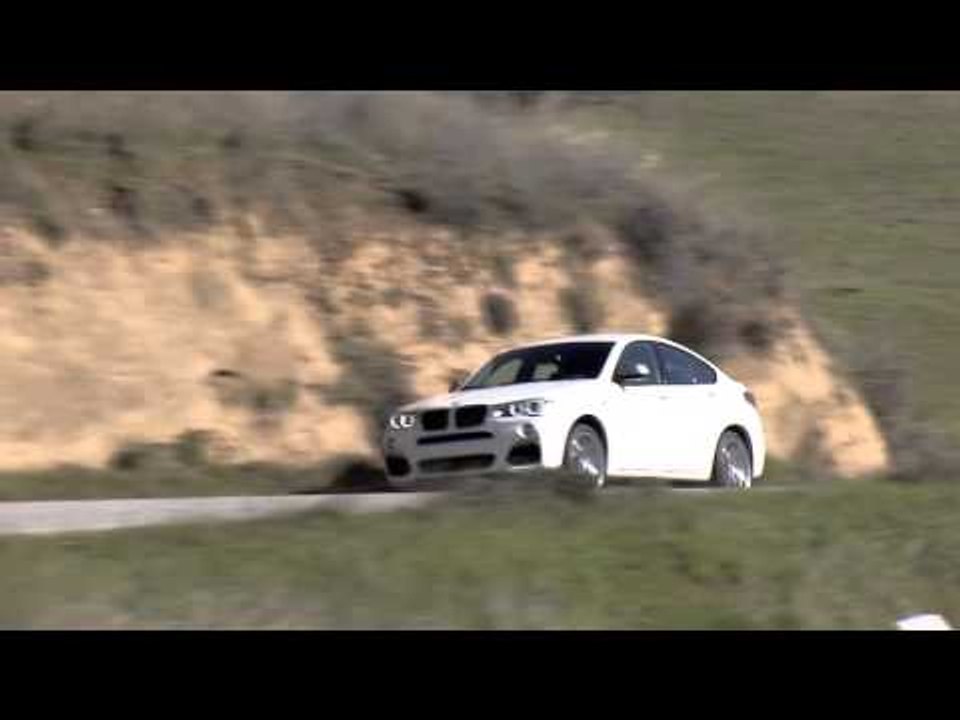 The new BMW X4 M40i Driving Video at Laguna Seca | AutoMotoTV