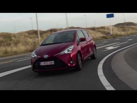 2017 Toyota Yaris Hybrid Driving Video in Red Trailer | AutoMotoTV