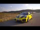 Porsche 911 GT2 RS in Racing Yellow Driving on the road