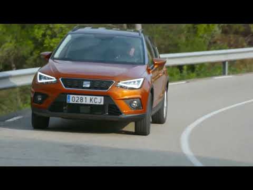 Seat Arona in Eclipse Orange Driving in the country