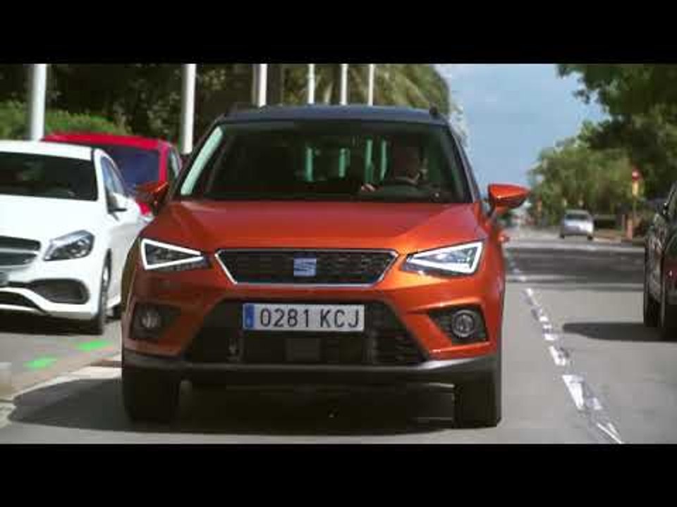 Seat Arona in Eclipse Orange Driving in the city