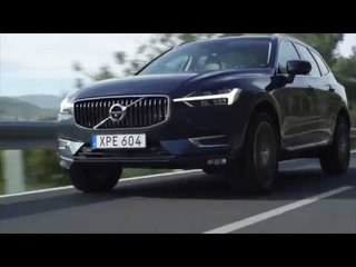 The new Volvo XC60 T6 in Denim Blue Driving Video