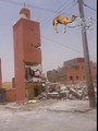 فيديو اليوم : لحظة هدم صومعة مسجد الزاوية بحي سوق الزاج بالعيون لإعادة تهيئة المسجد .