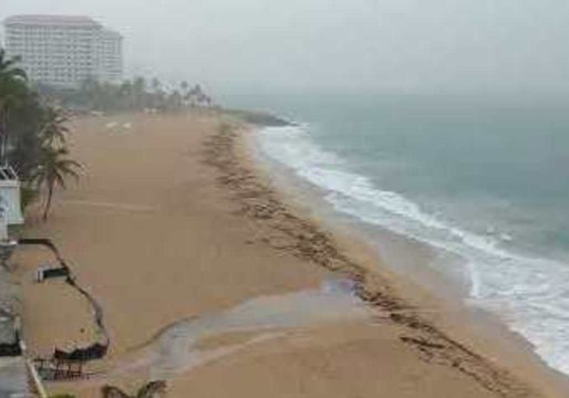 Beryl Remnants Wash Across Puerto Rico with Thunderstorms