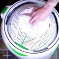 This portable washing machine uses zero electricity and can do a load of laundry in just FIVE minutes!  Credit: yirego.com