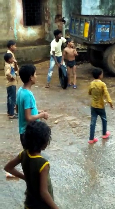 Village boy doing an Amazing trick with a Tyre...!!!!Must see video...!!!
