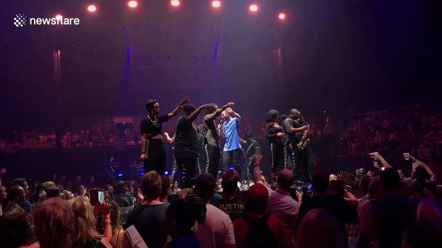 Justin Timberlake downs a shot and claims 'it's coming home!' at O2 concert