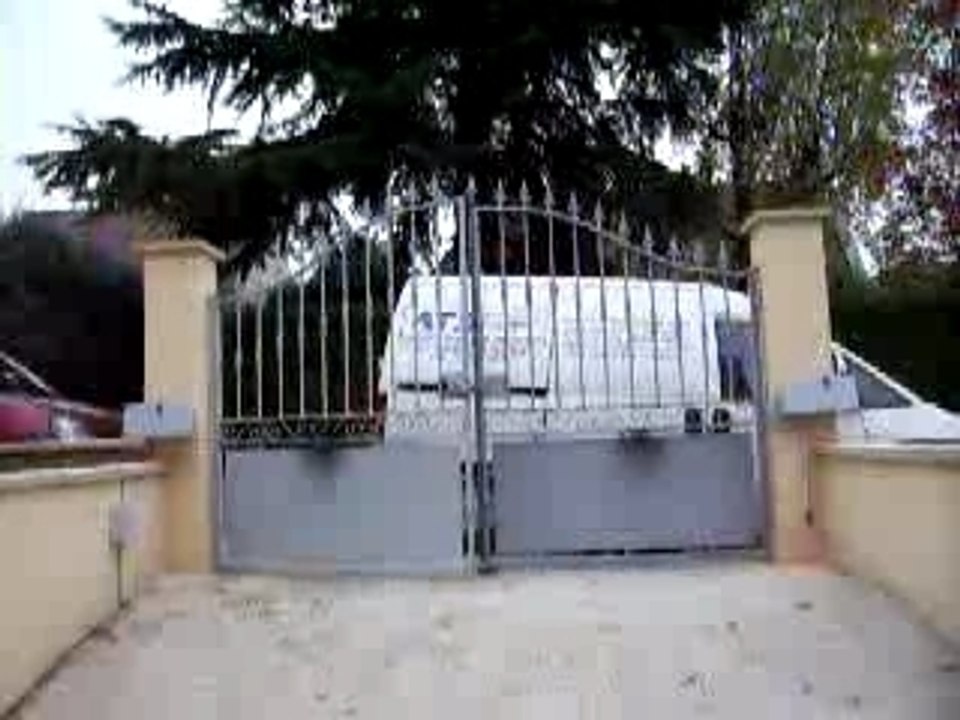 Motorisation d'un portail par bras articulés ATS PORTAIL