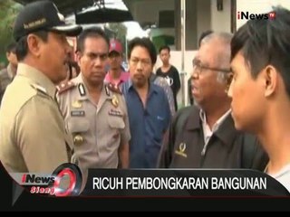 Download Video: Pembongkaran bangunan di bantaran sungai kali Ciliwung tadi pagi nyaris ricuh - iNews Siang 12/01