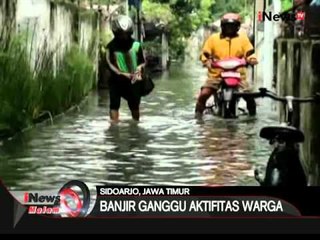 Скачать видео: Banjir merendam ratusan rumah warga di Jombang, Bungo dan Sidoarjo - iNews Malam 07/02