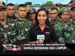 Скачать видео: Live Report: Gisca Pasaribu, Warga bersihkan sisa lumpur banjir di Binjai - iNews Petang 11/02