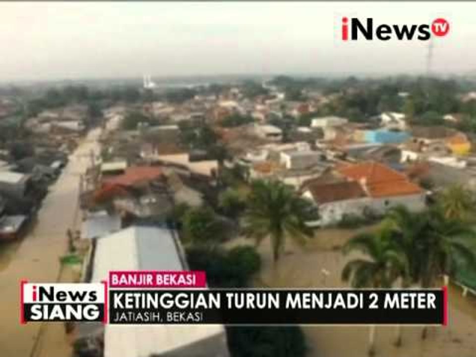 Ketinggian air di Kompleks Pondok Gede Permai mulai surut menjadi 2 meter - iNews Siang 22/04