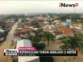 Ketinggian air di Kompleks Pondok Gede Permai mulai surut menjadi 2 meter - iNews Siang 22/04