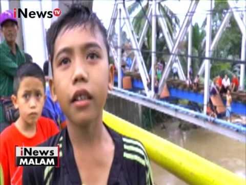 Demi uang receh, anak - anak di Banten lakukan aksi lompat ke sungai - iNews Malam 12/12