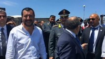 Italy's anti-immigrant interior minister visits migrant camp