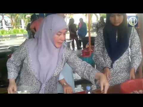 Tunku Azizah lawat mangsa banjir di SMK Pandan