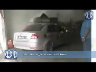 Download Video: Lelaki nekad langgar kenderaan penarik kereta