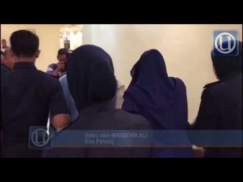 Pasangan suami isteri dihadap ke mahkamah