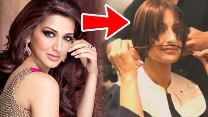 ಕ್ಯಾನ್ಸರ್‌ನಿಂದ ಬಳಲುತ್ತಿರುವ ಸೋನಾಲಿ ಕೂದಲಿಗೆ ಬಿತ್ತು ಕತ್ತರಿ..!! | Filmibeat Kannada