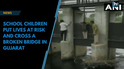 School children put lives at risk and cross a broken bridge in Gujarat