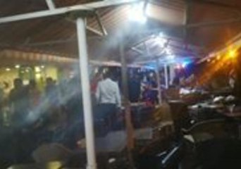 Restaurant Workers Clean up Debris After French Football Fans Stampede in Nice