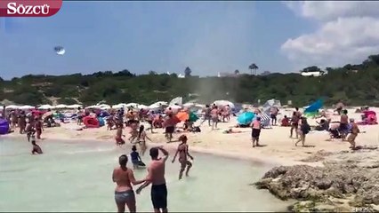 Sahilde çıkan şiddetli rüzgar plajı birbirne kattı