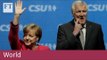 Merkel and Seehofer reach deal over migration policy