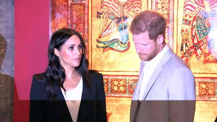 Harry and Meghan greet fans at Trinity College Dublin