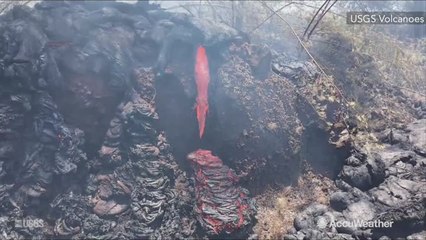 Lava oozes from fresh breakout of fissure 8 in Hawaii