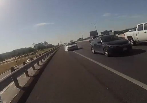 Police Officer Jumps From Path of Moving Car on Texas Highway