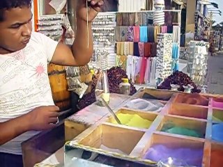 Painting by colored sand in a glass bottle Awsome!