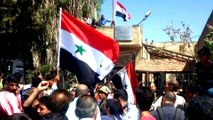 Syria's Deraa: Regime raises flag in cradle of protest movement