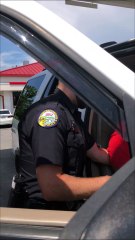 Police Arrest Woman at Gas Station