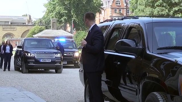 Melania Trump all smiles as she meets schoolchildren and Chelsea pensioners at London hospital - and even plays bowls