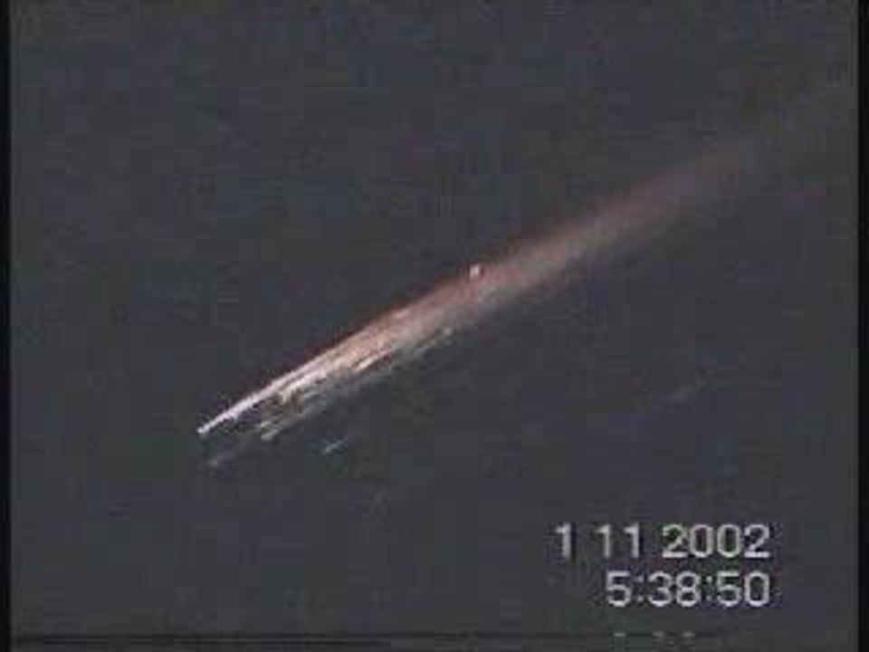UFO breaking an asteroid-slow