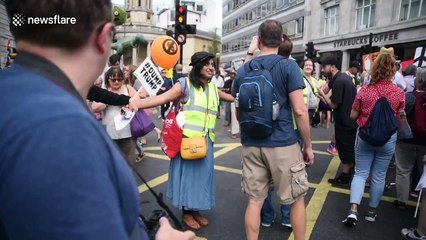 Giant Trump model seen towering over protesters in London